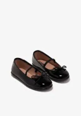 Black patent leather ballerinas